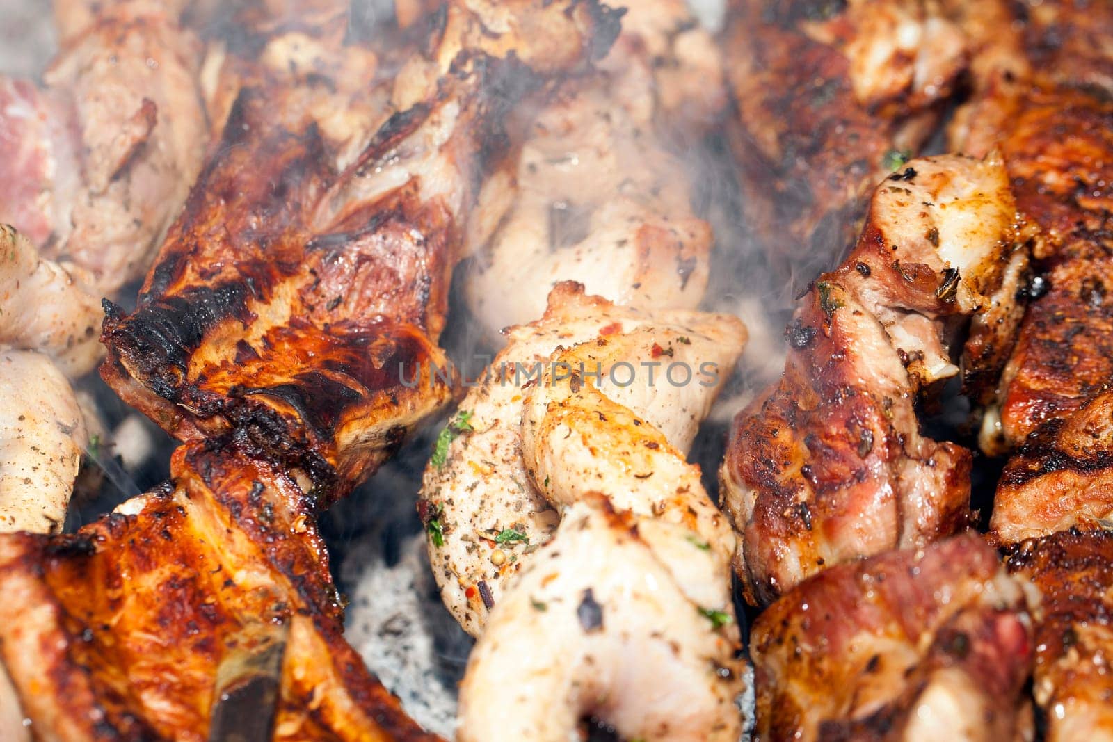 photographed closeup kebab made in nature. Used large pork meat