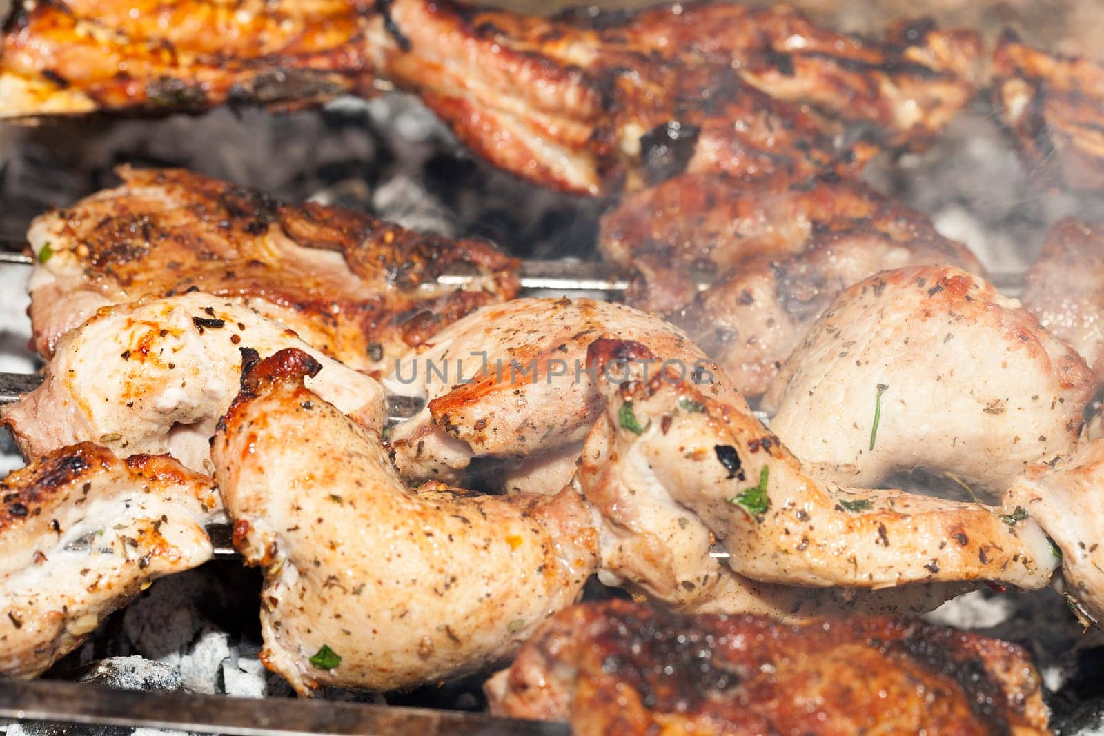 photographed closeup kebab made in nature. Used large pork meat
