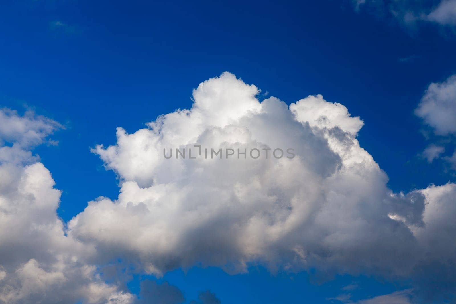 photographed close-up white clouds are in the blue sky, shallow depth of field