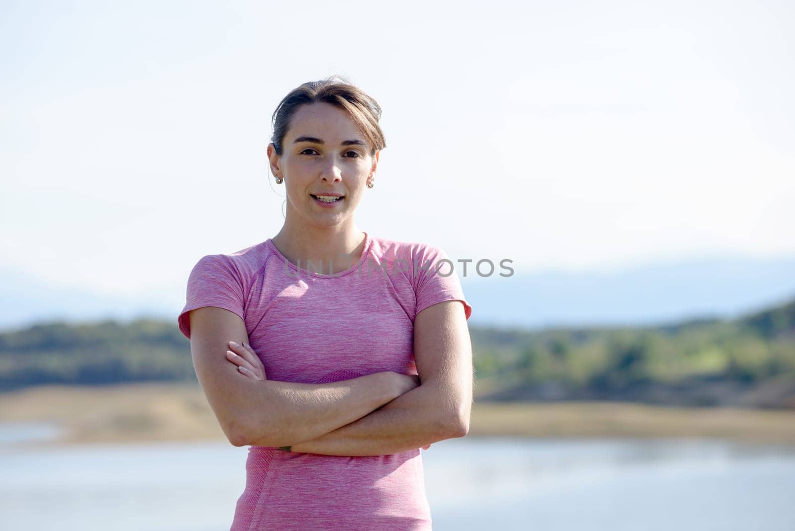 portrait of a young sporty woman in the countryside