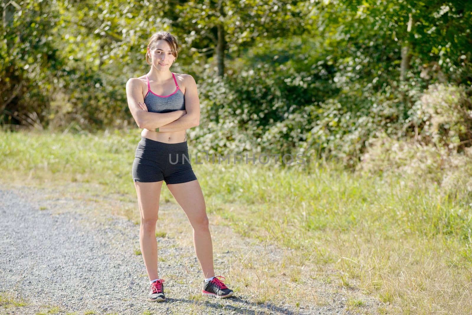 beautiful young sporty woman in the countryside