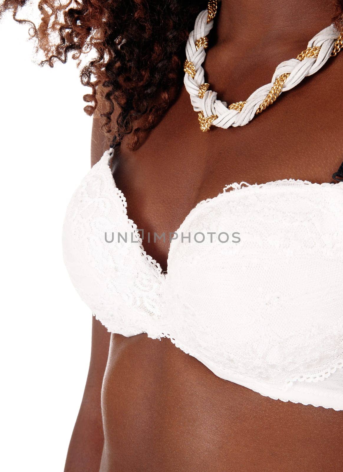 A closeup image of a slim African American woman in a white bra, .body part, isolated for white background..
