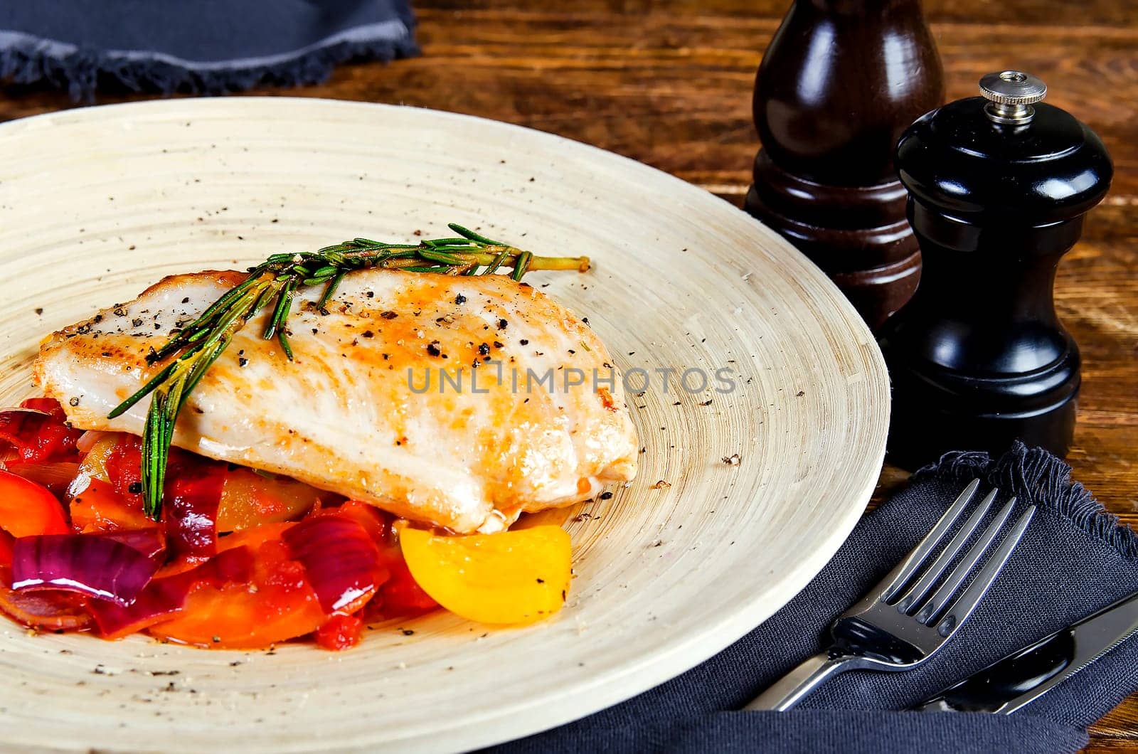 Ratatouille. Chicken breast fillet fried with vegetables.
