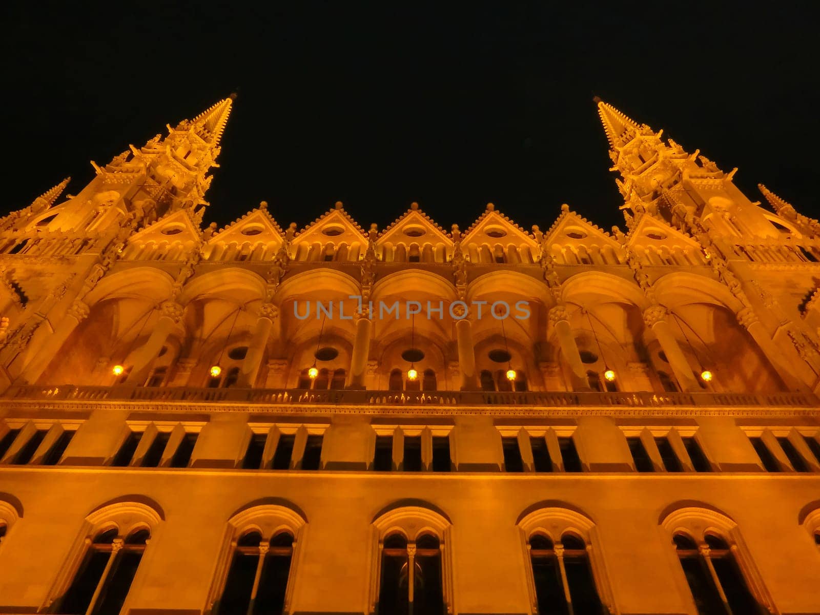 Budapest Parliament in Hungary at night on the Danube river