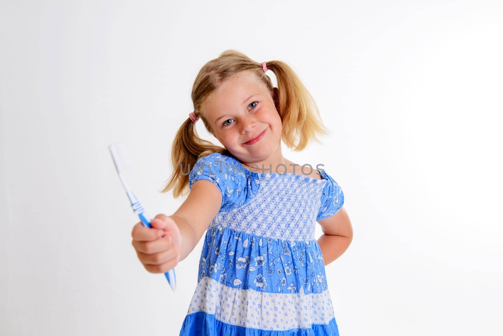 little funny girl with space width and toothbrush