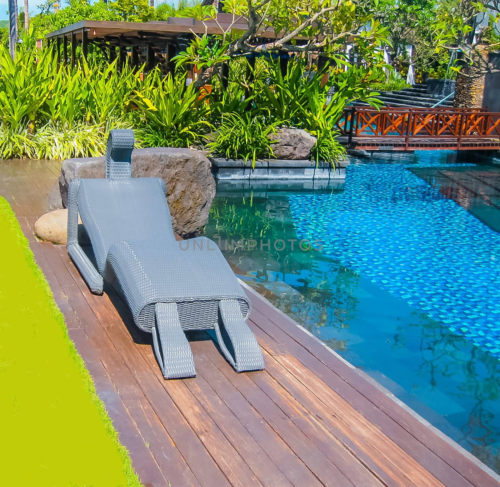 Nusa Dua, Bali, Indonesia - April 14, 2014: View of swimming pool at St. Regis Bali Resort
