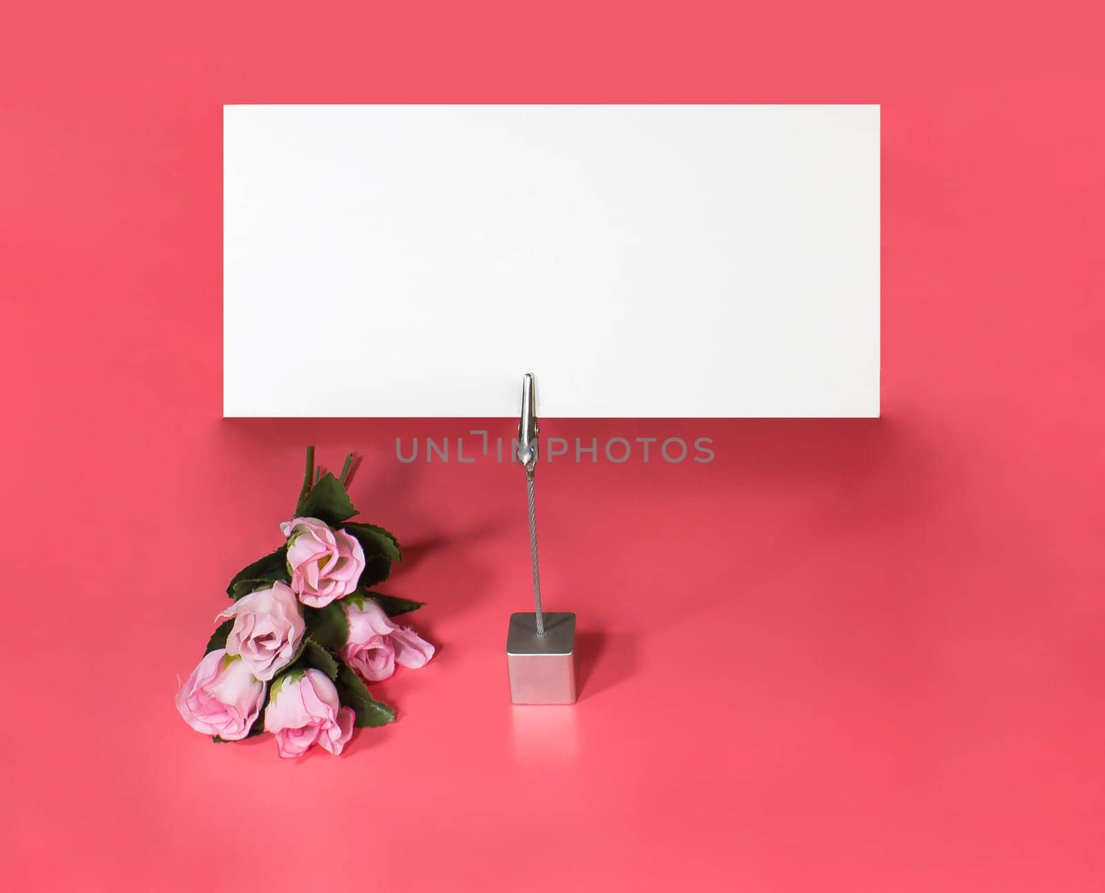A note holder with a roses and a empty card for your text