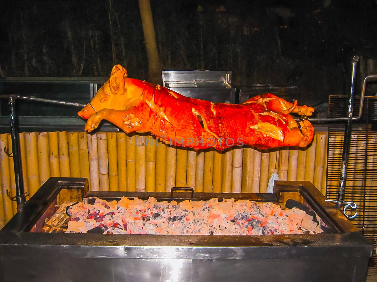 Roasted pig on the spit at Thailand