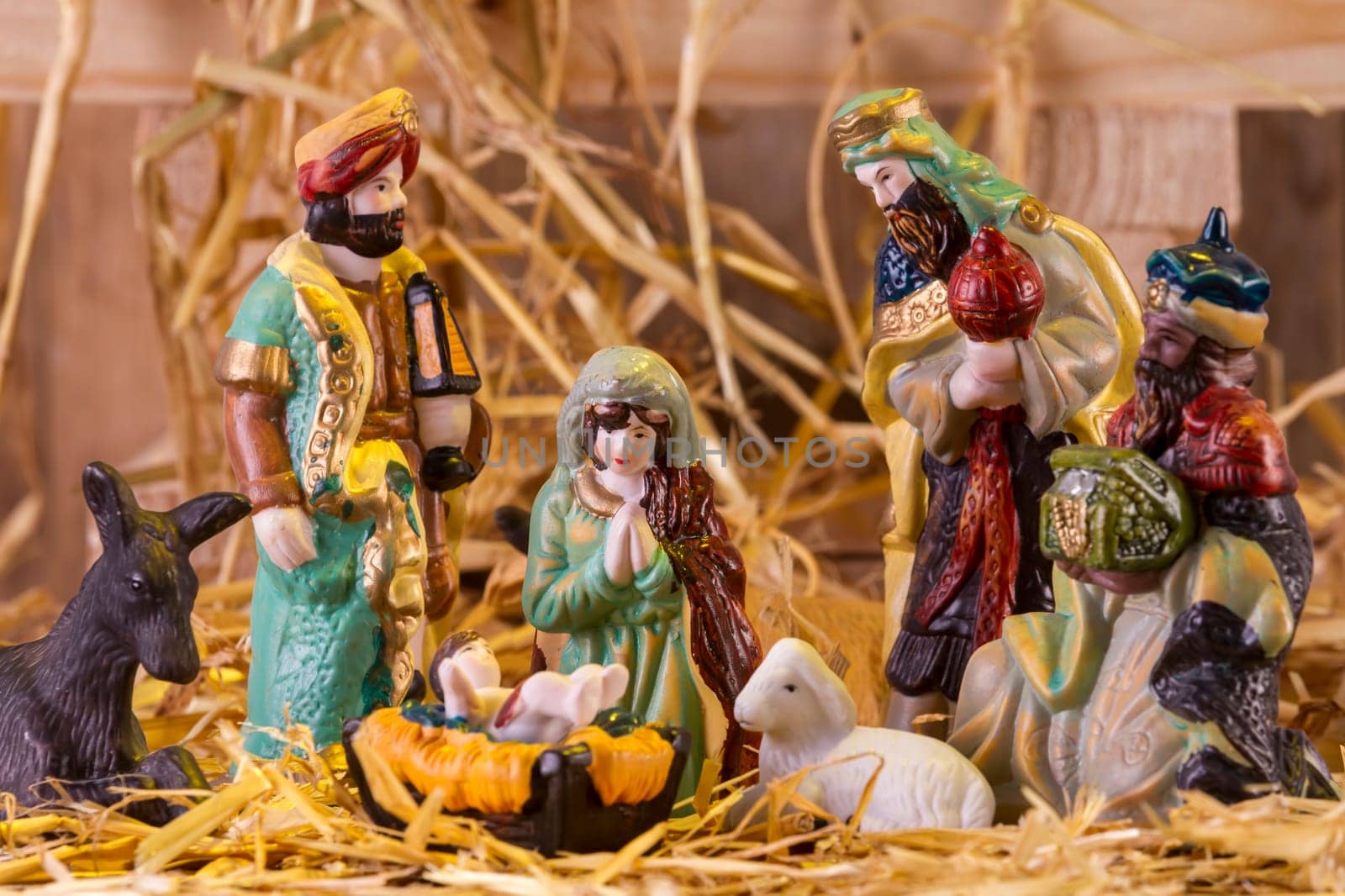 Christmas Manger scene with figurines including Jesus, Mary and magi. Focus on Mary!.