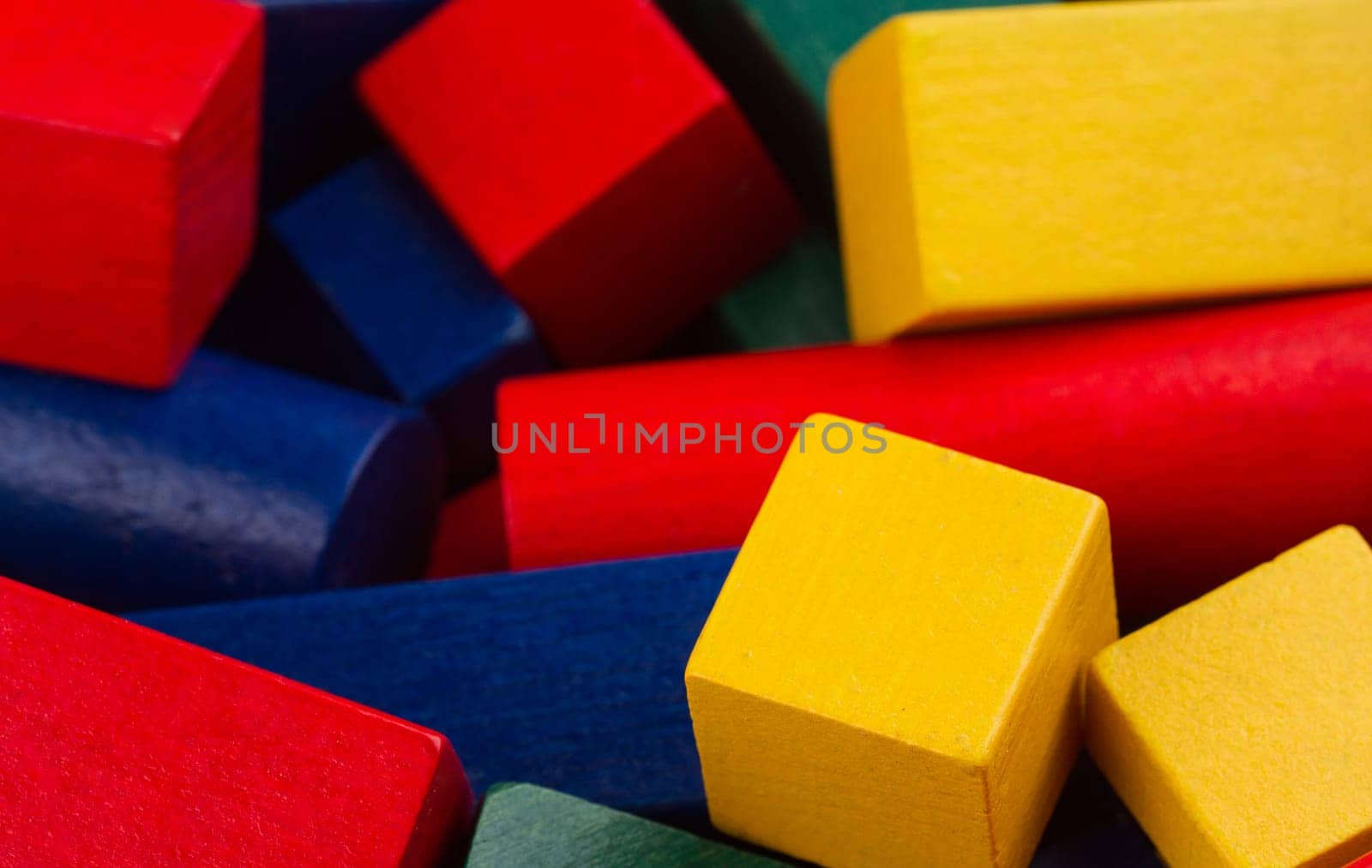 top view colored wooden toy construction blocks background