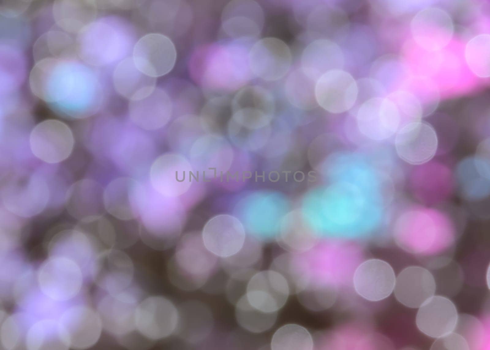 Defocused abstract pink and yellow Christmas bokeh background