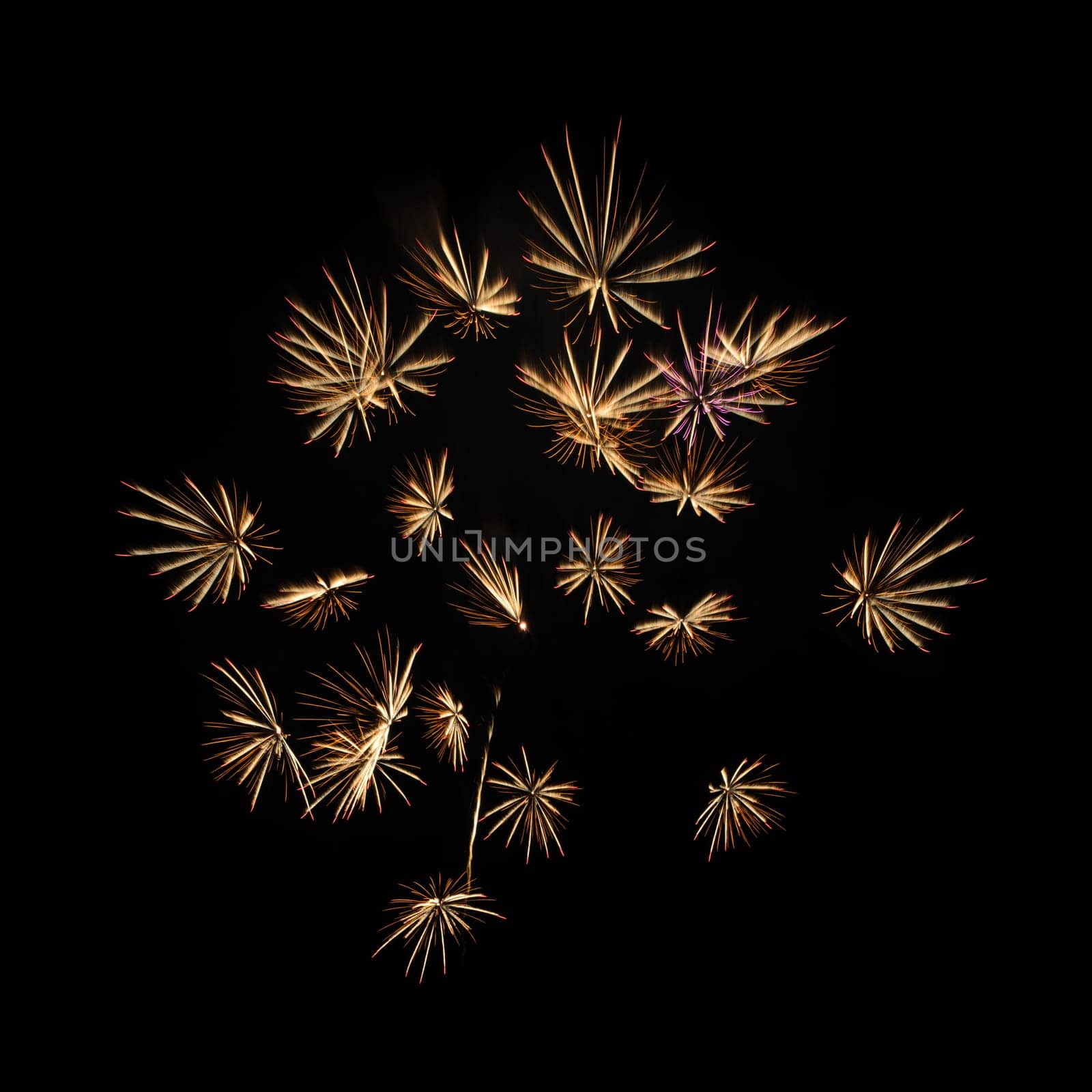 Yellow fireworks on night sky background