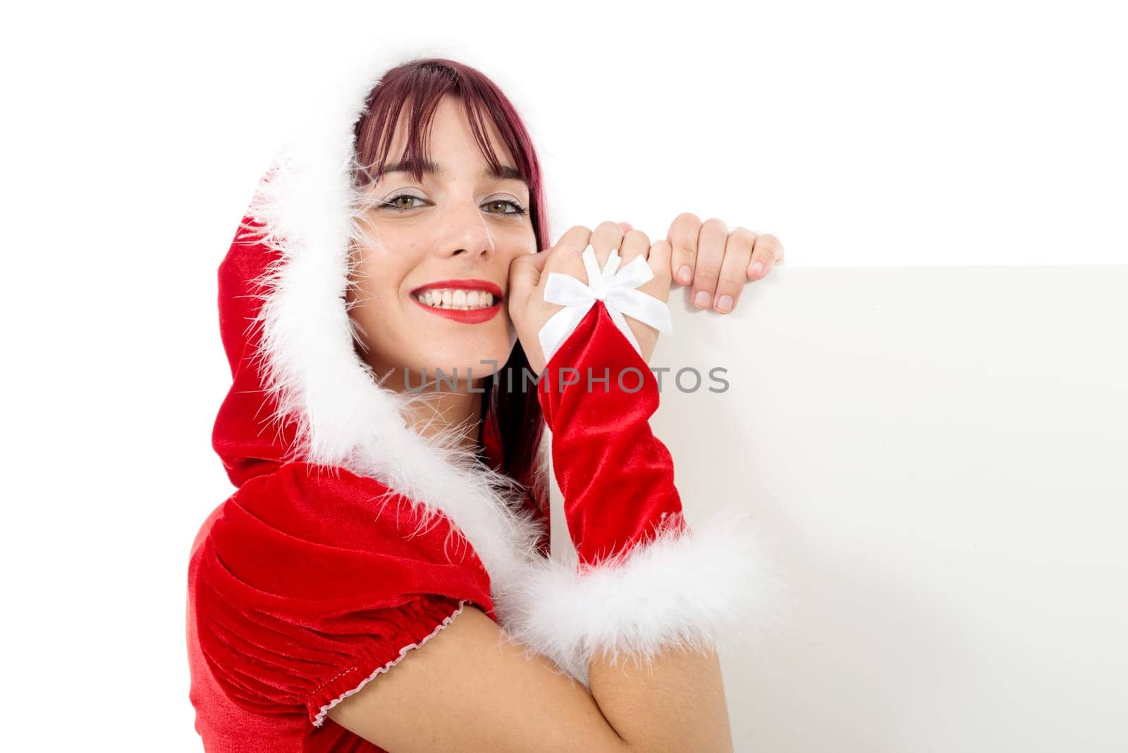 portrait of beautiful sexy girl wearing santa claus clothes