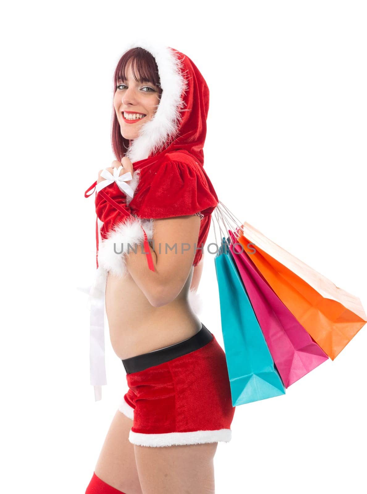 beautiful sexy girl dressed like Santa with Christmas presents