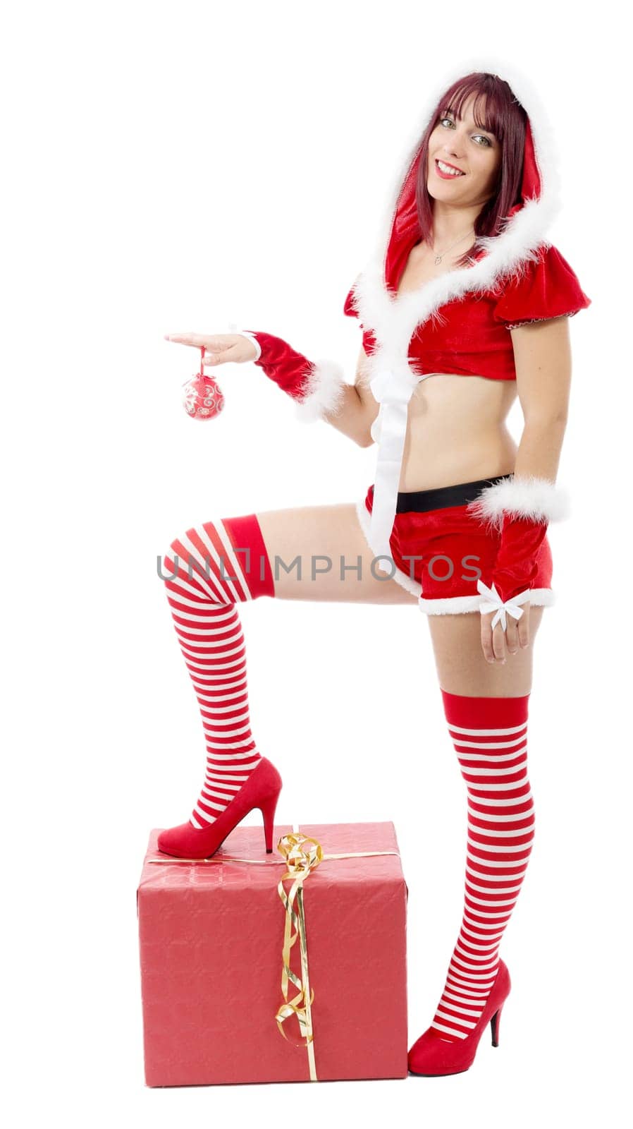 Beautiful sexy girl in Christmas costumes posing on a white background