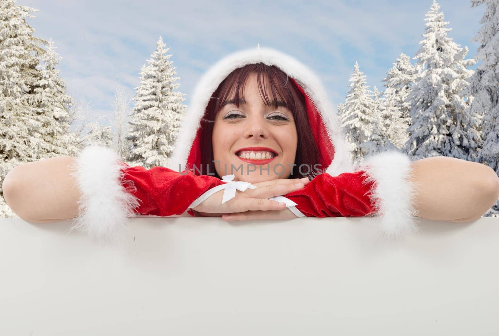 Portrait of beautiful sexy woman wearing santa claus clothes