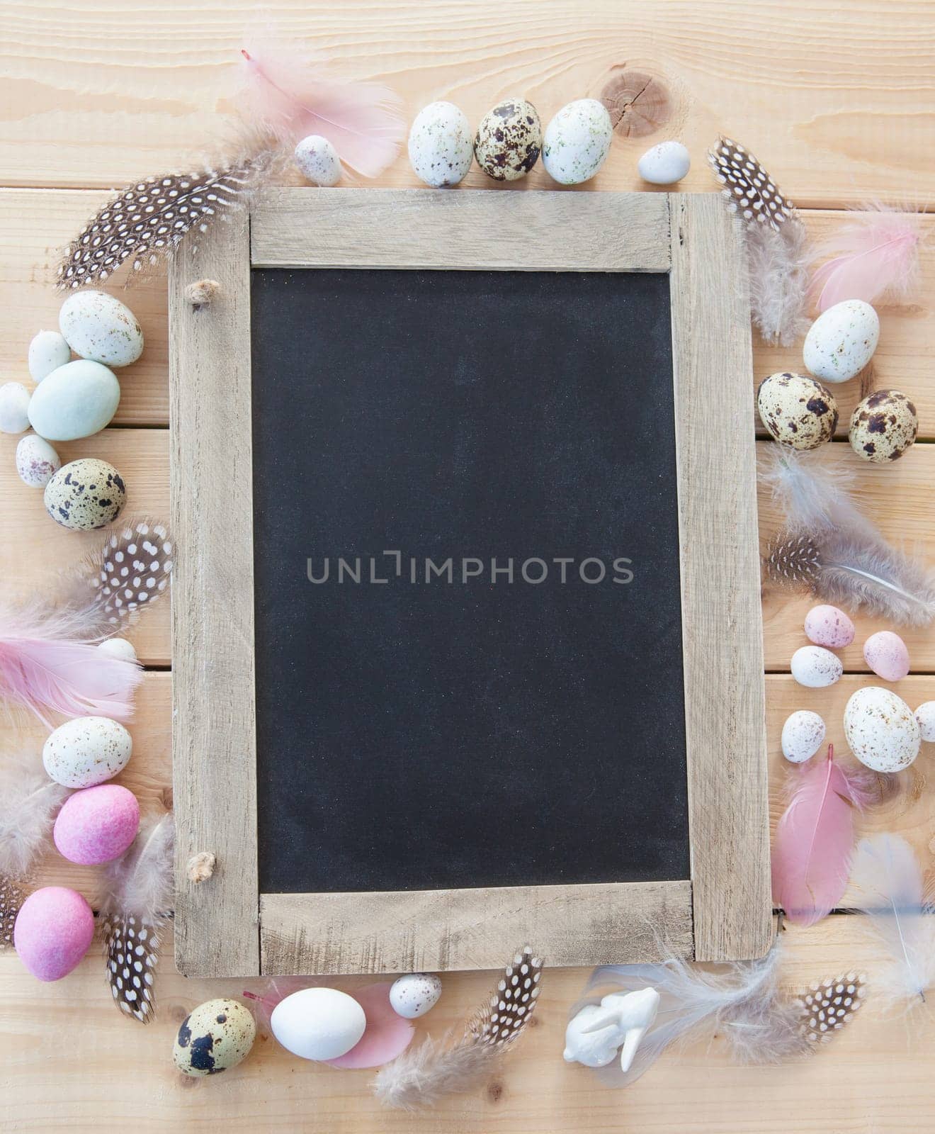 Rustic background at Easter with colorful Easter eggs
