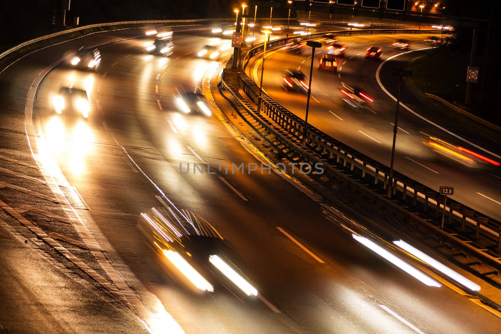 cars on highway by night