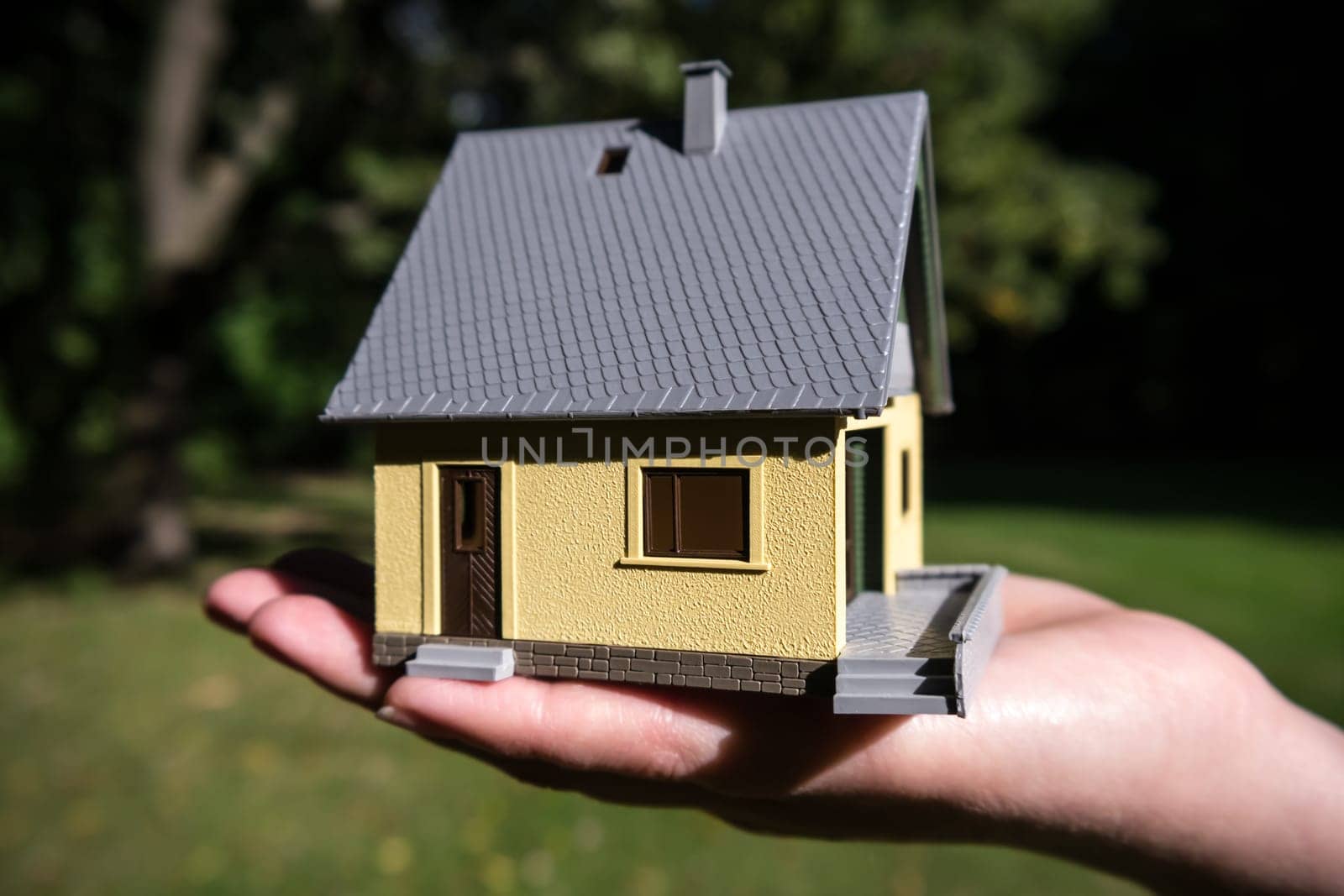 modell house on hand outdoor