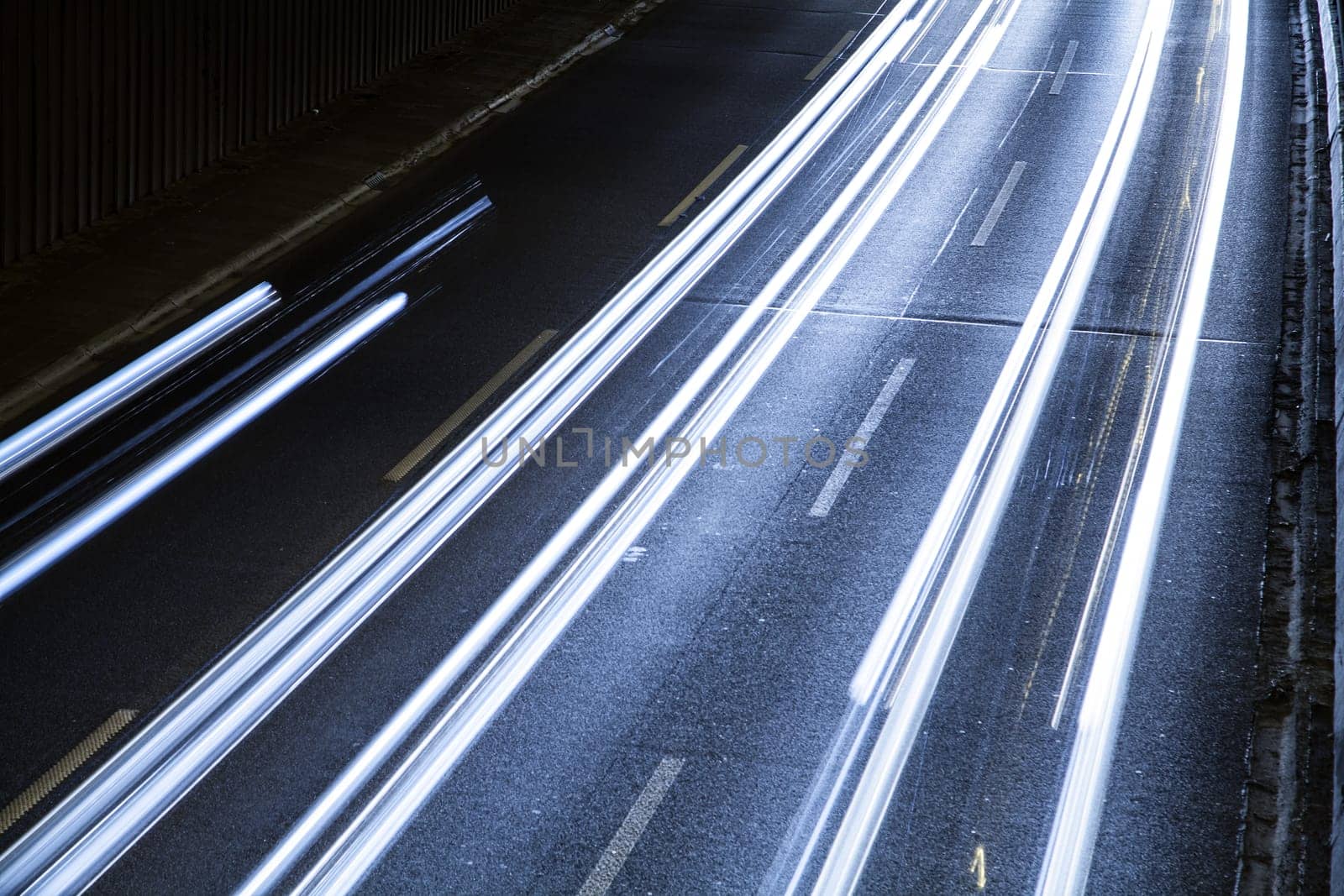 cars on highway in blue light