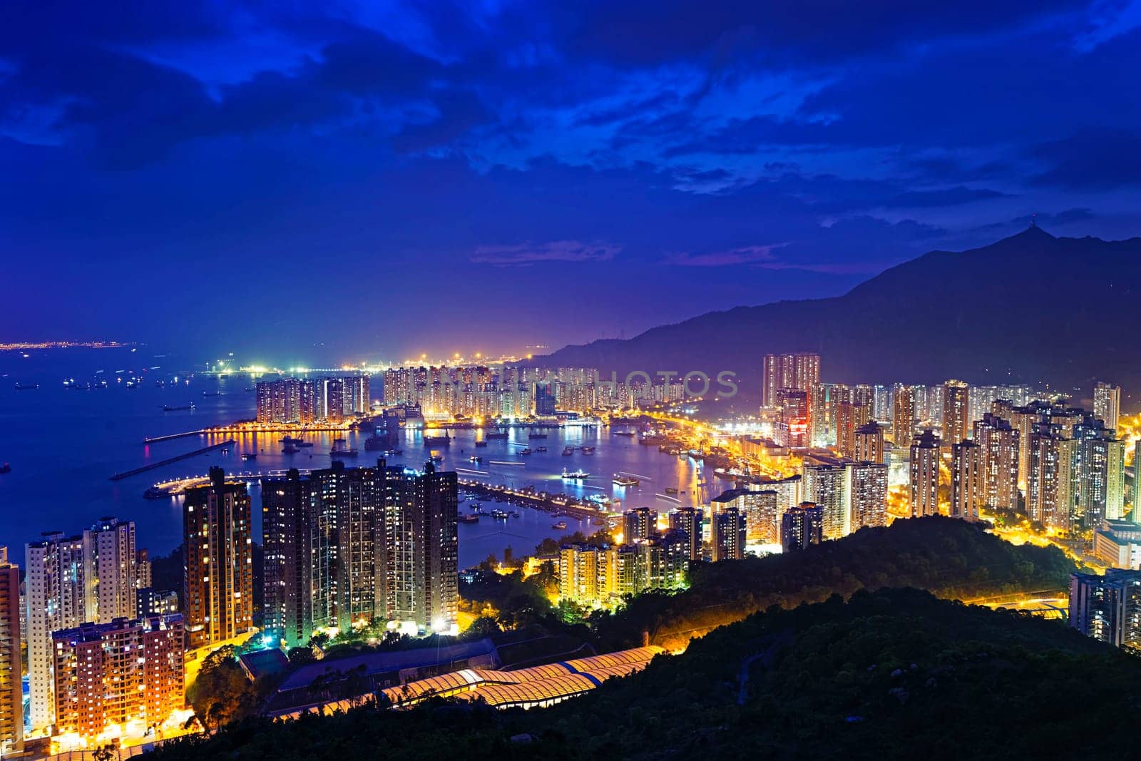 Hong Kong Tuen Mun skyline and South China sea at night