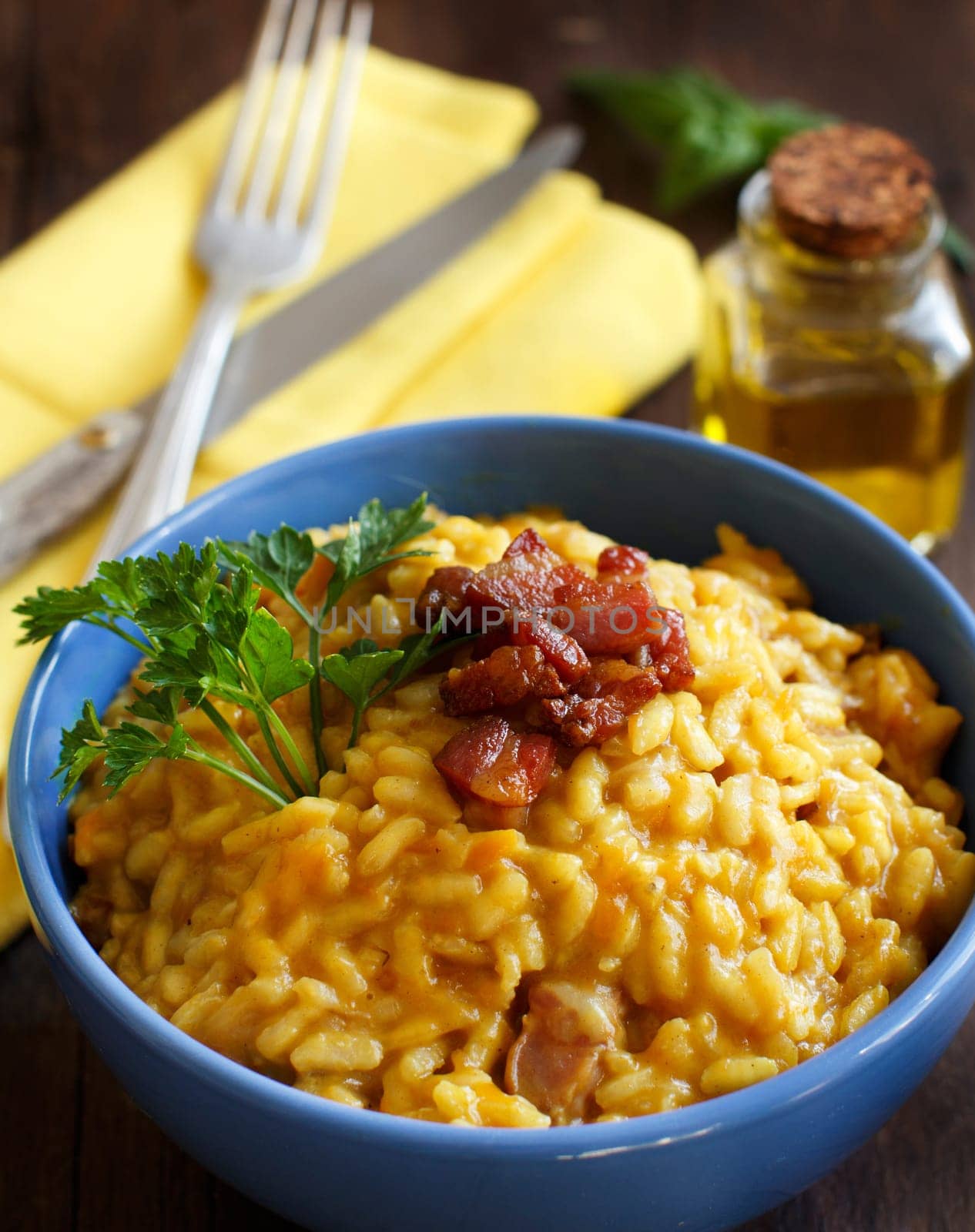 Risotto with a pumpkin and bacon close up