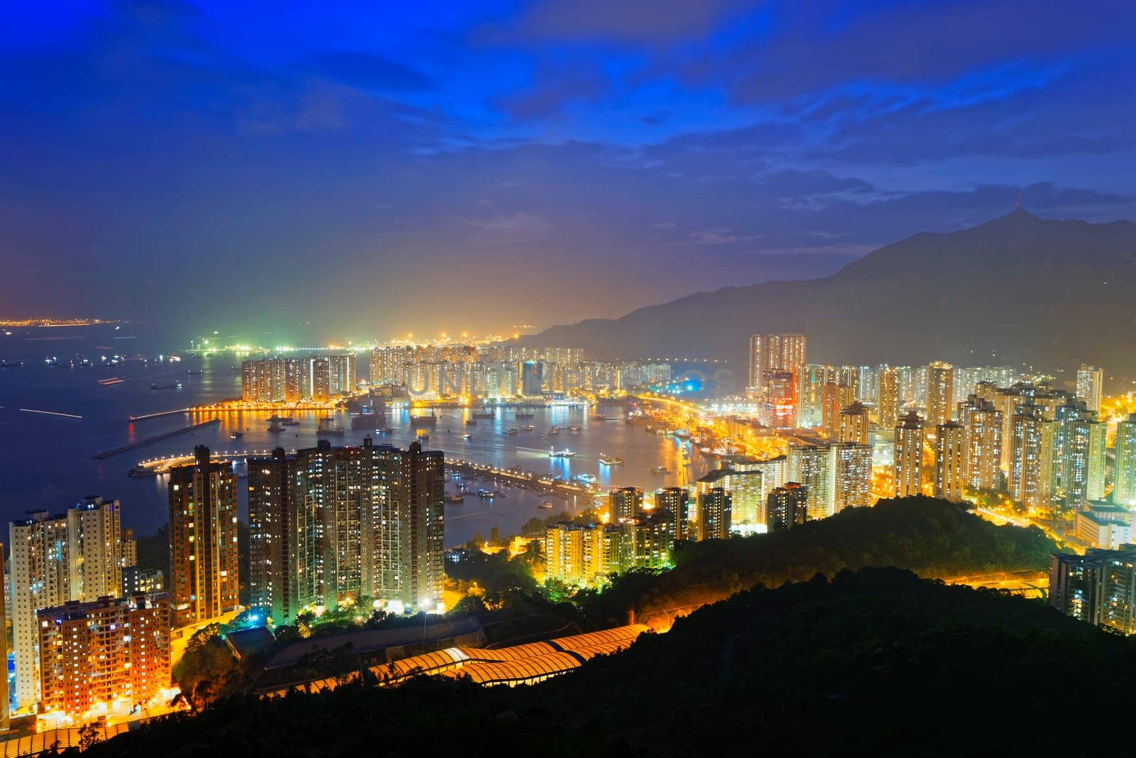 Hong Kong Tuen Mun skyline and South China sea at night