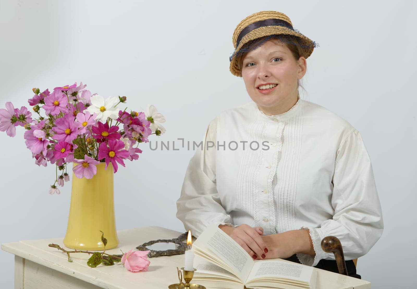 young woman in vintage costume 1900s