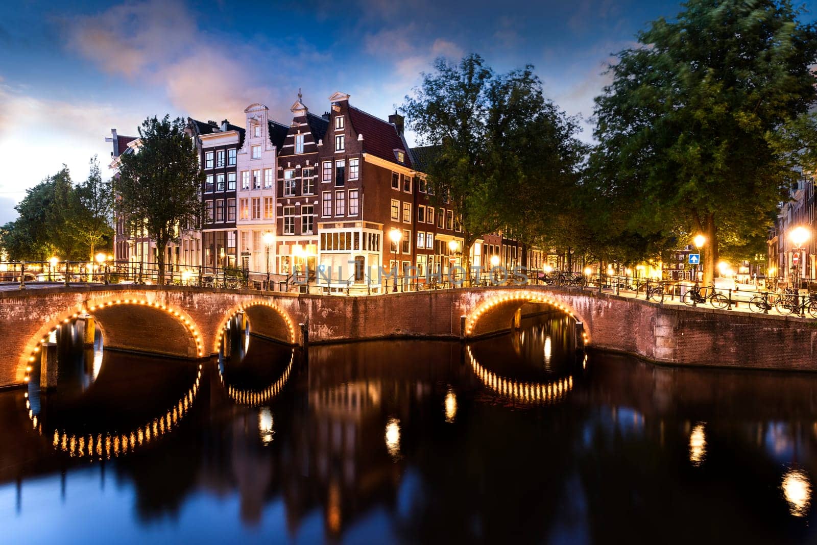 Amsterdam city by night with classified UNESCO canals, Netherlands