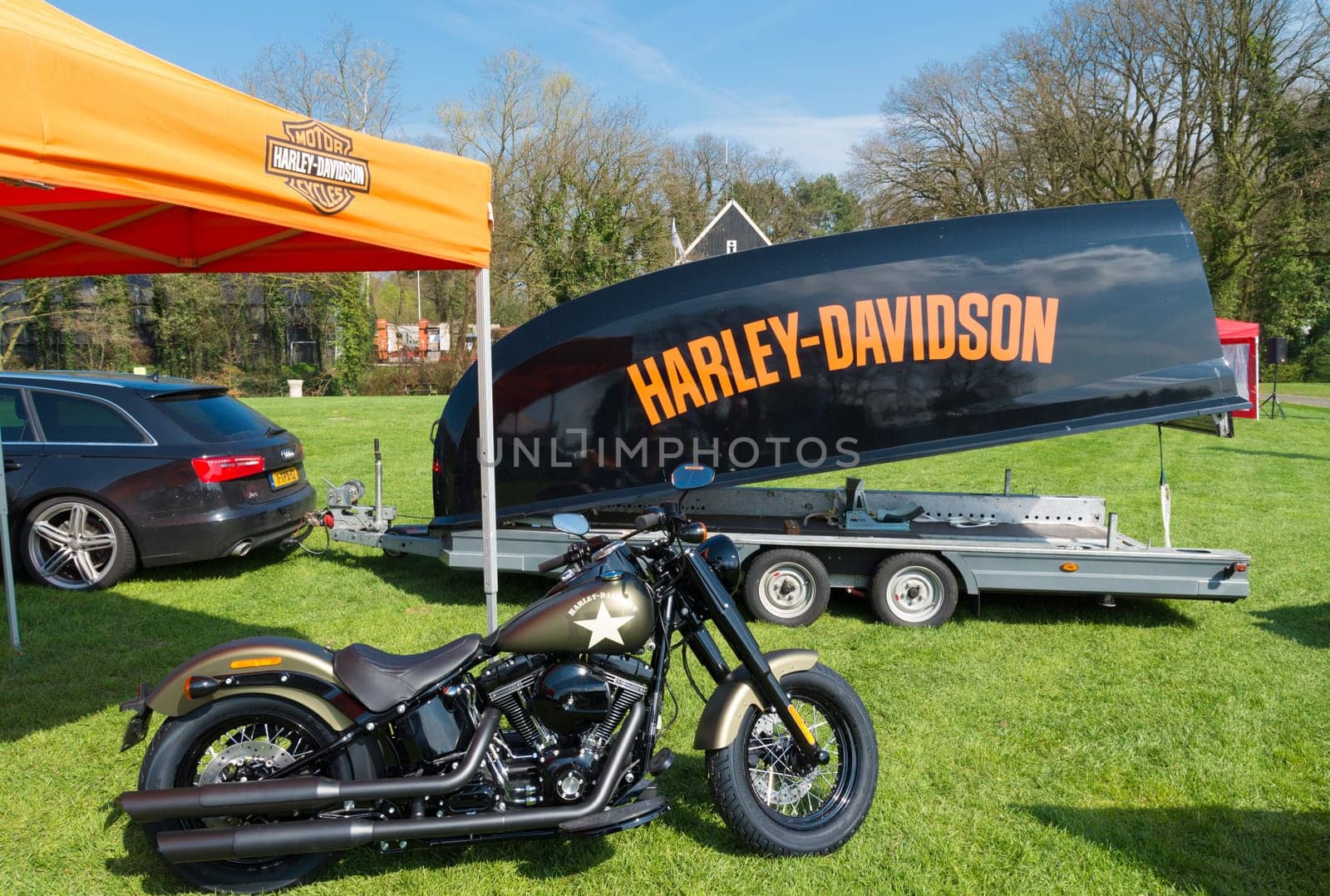 OLDENZAAL, NETHERLANDS - APRIL 10, 2016: Harley-Davidson motorbike and custom made trailer on the annual Hulsbeek day in the netherlands