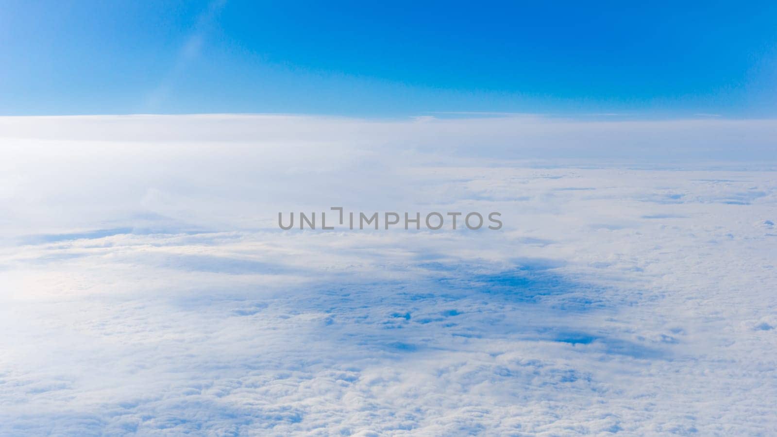 clouds from airplane window. height of 10 000 km.  Clouds