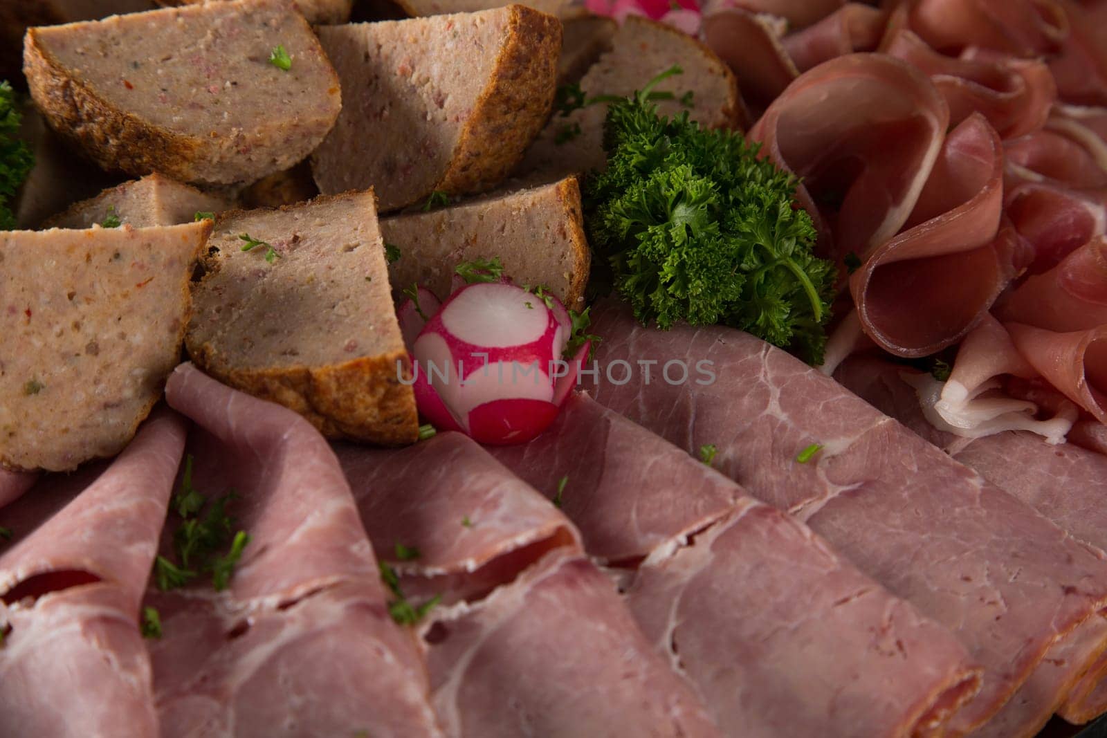 Assortment of meat delicatessen on a plate