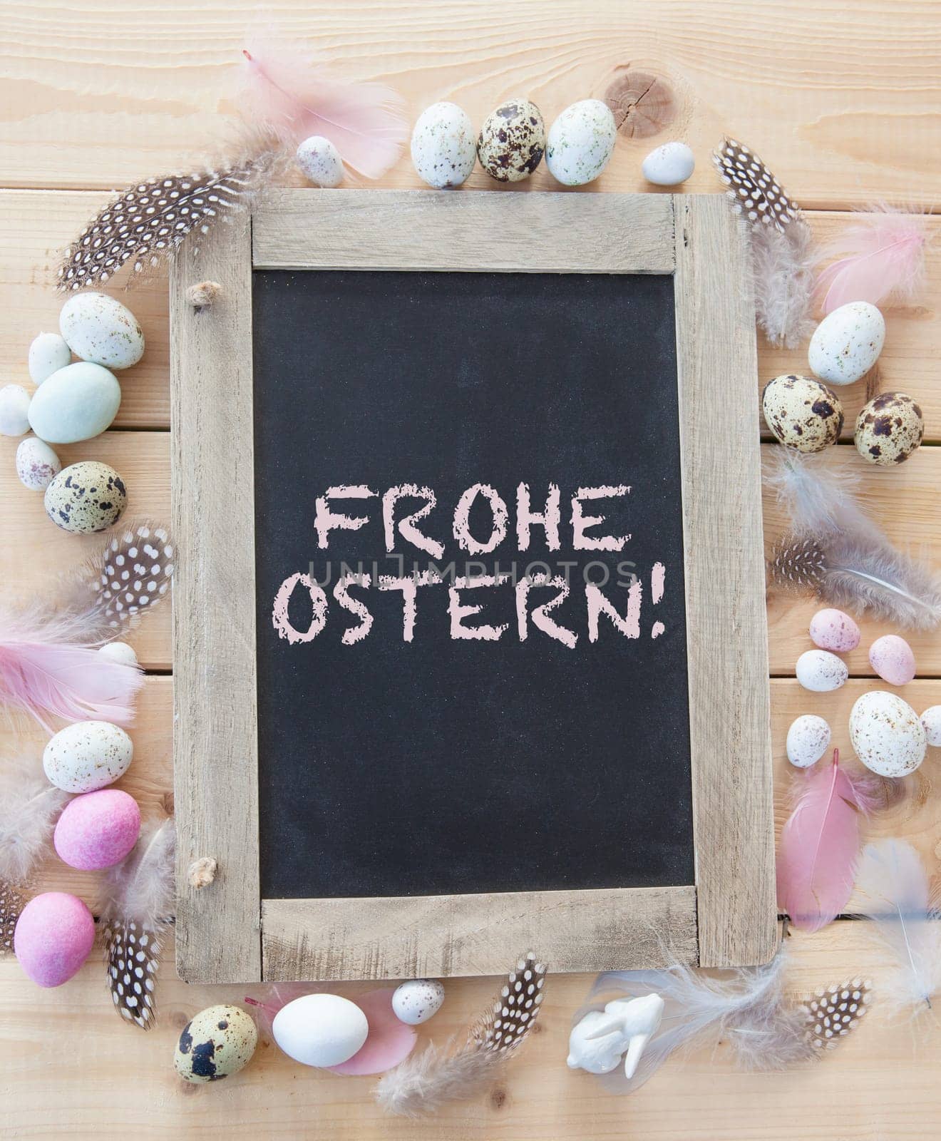 Rustic background at Easter with colorful Easter eggs