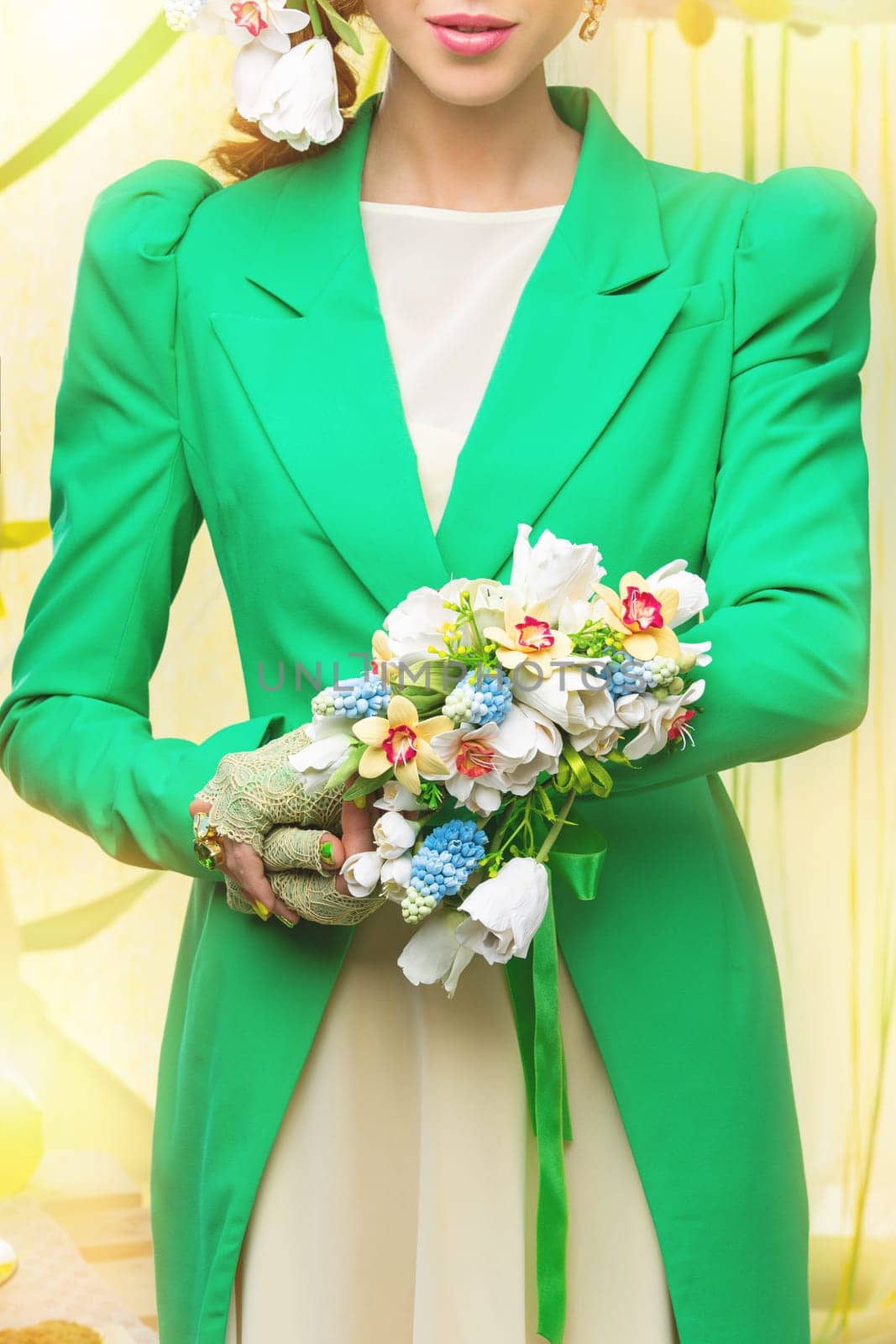 Closeup of spring bride holding beautiful bouquet from artificial art clay flowers made as bracelet