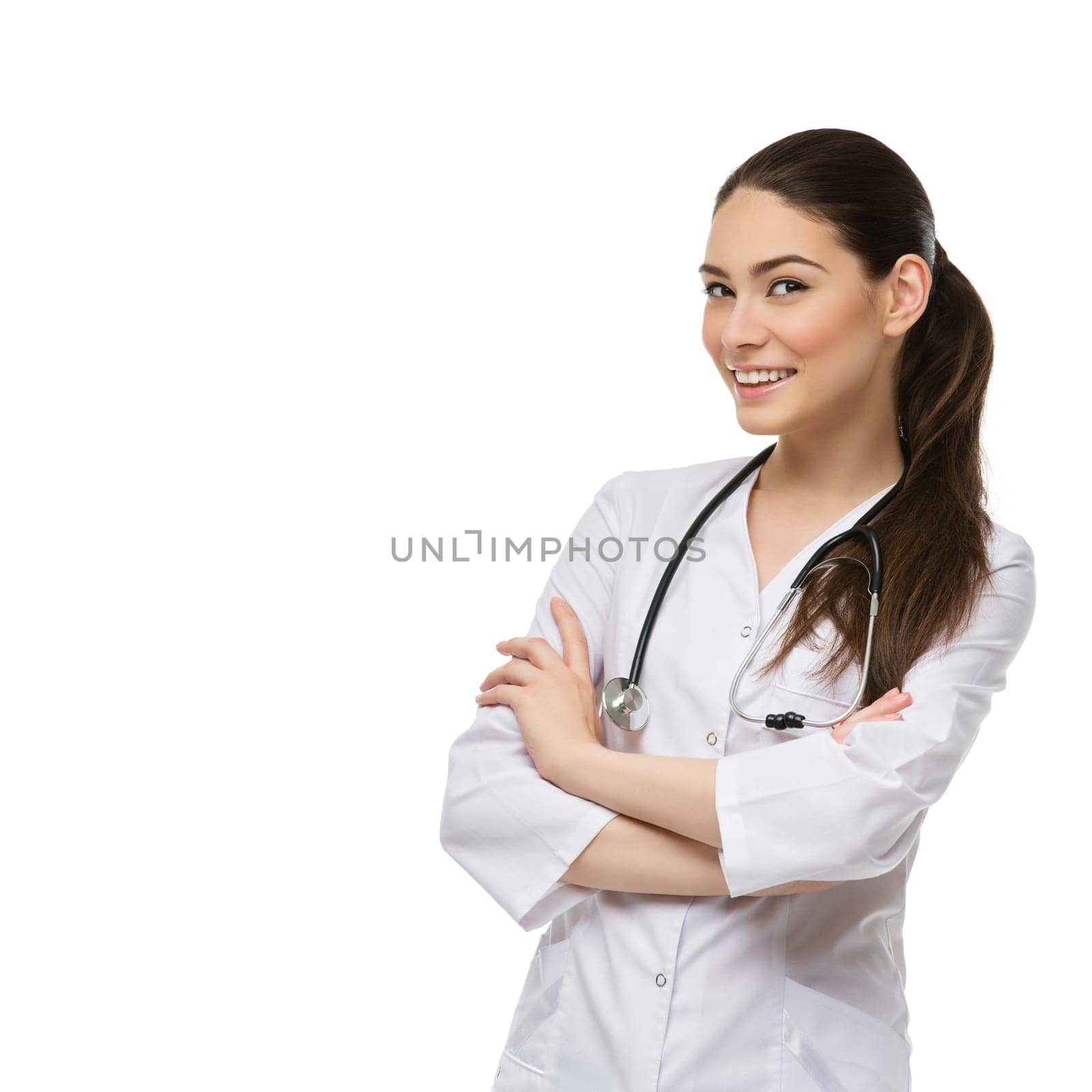 Portrait of beautiful young smiling woman dressed as doctor with stethoscope. Isolated over white background. Copy space.