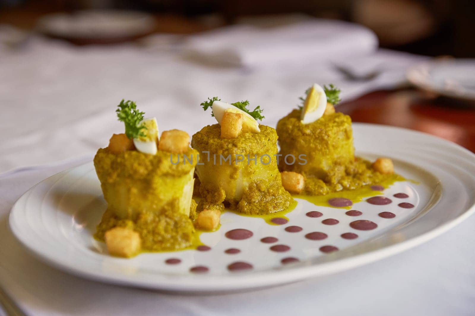 Traditional Peruvian Meal Called Ocopa Arequipena Served in a Restaurant.