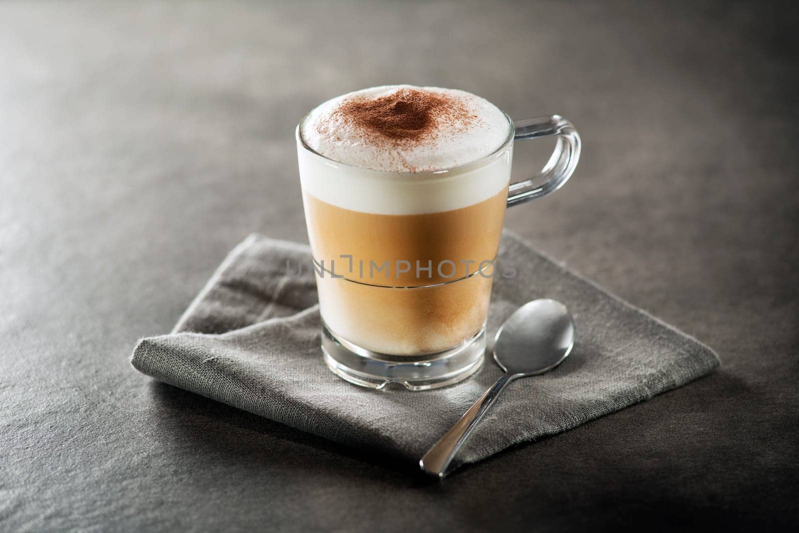 Cup of hot Cappuccino Coffee close up.