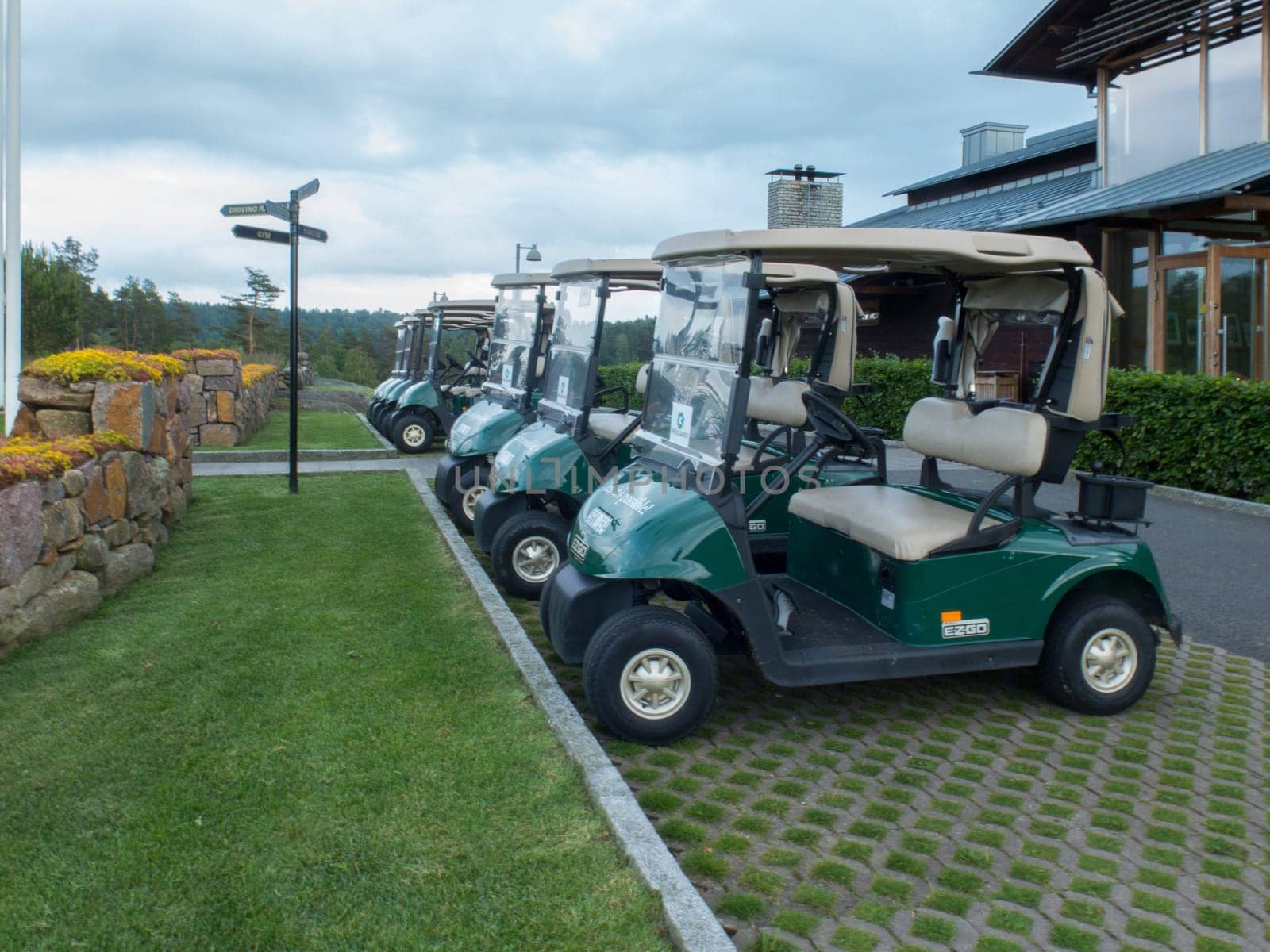Many golf car on hills golf club in sweden