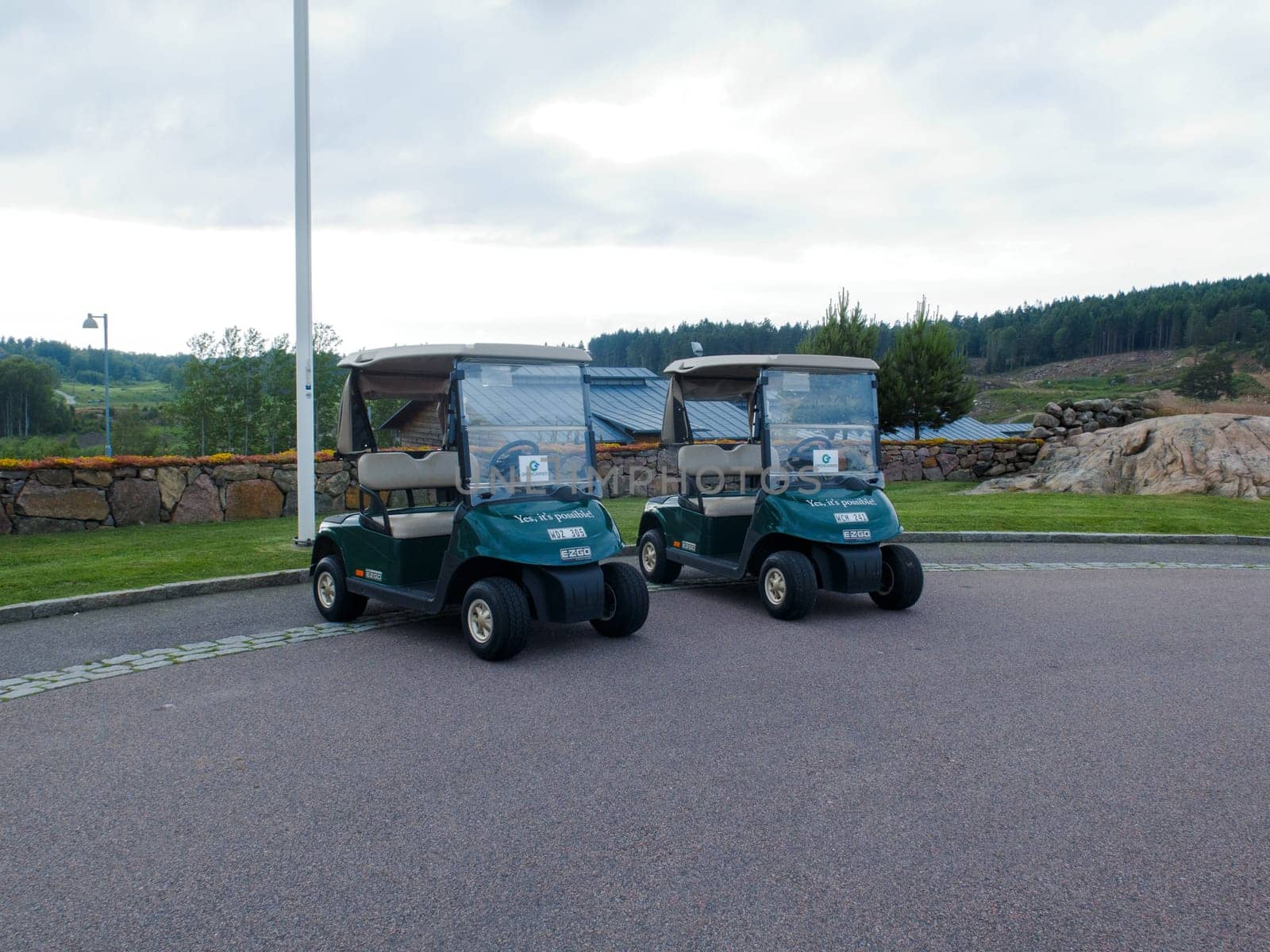 two golf car on hills golf club in sweden