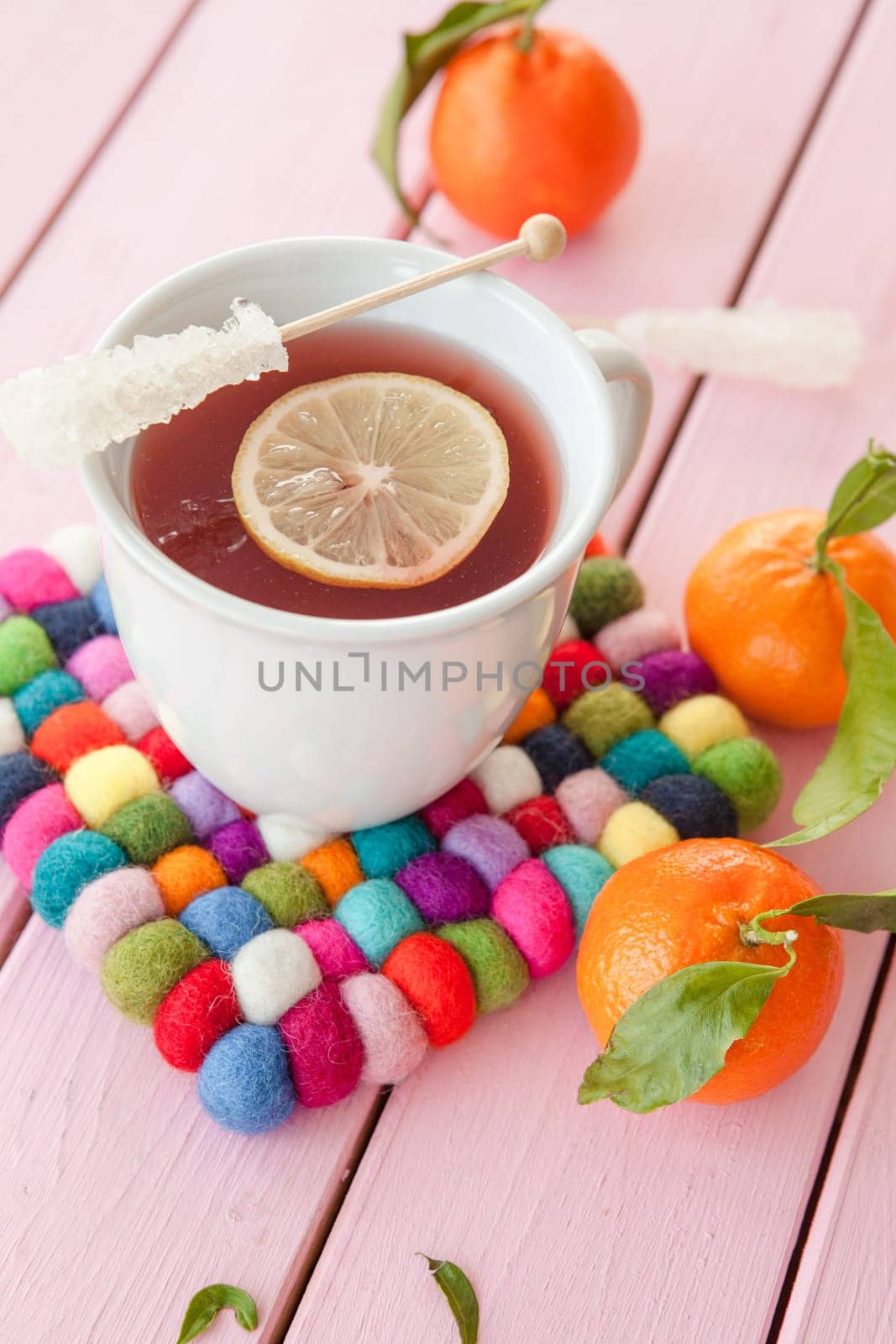 Cup of tea with lemon and fresh manderines