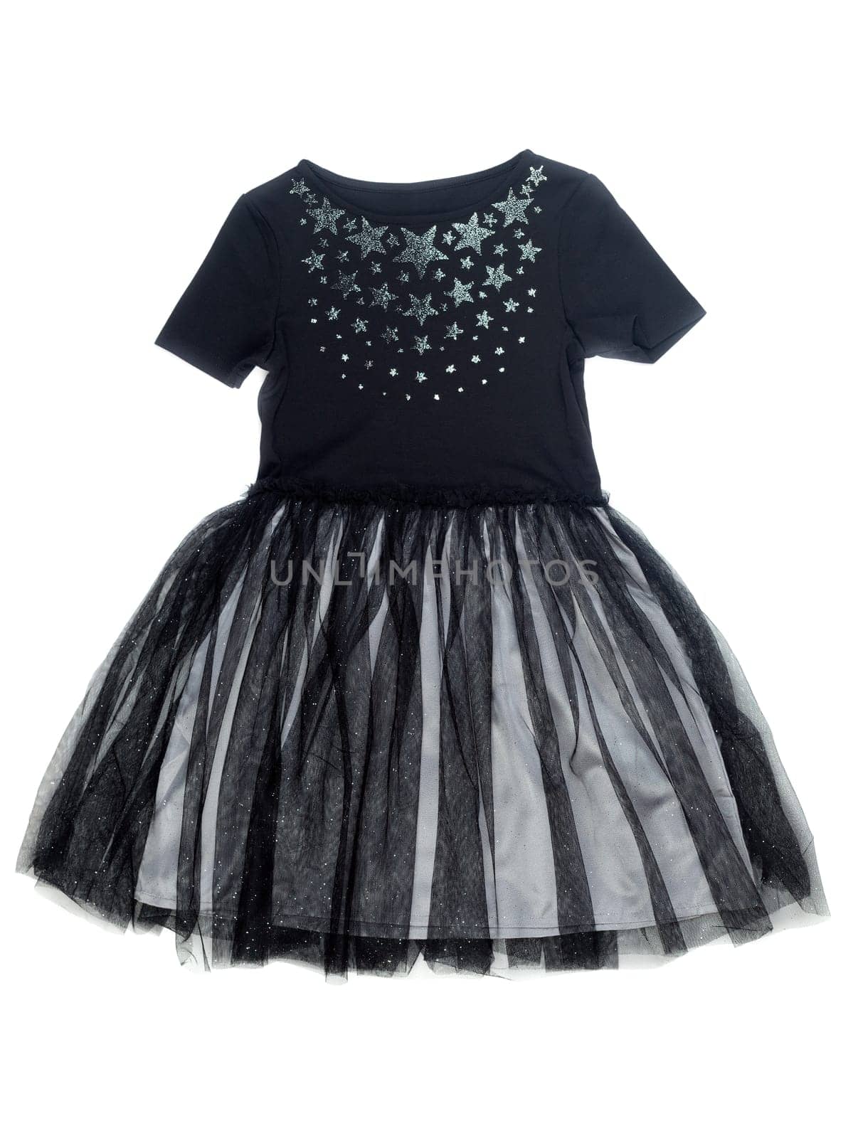 Black dress with a pattern of stars. Isolate on white background.