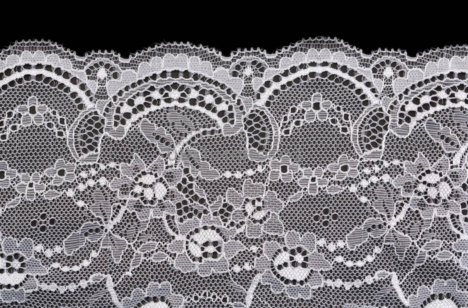Vintage lace with flowers on black background