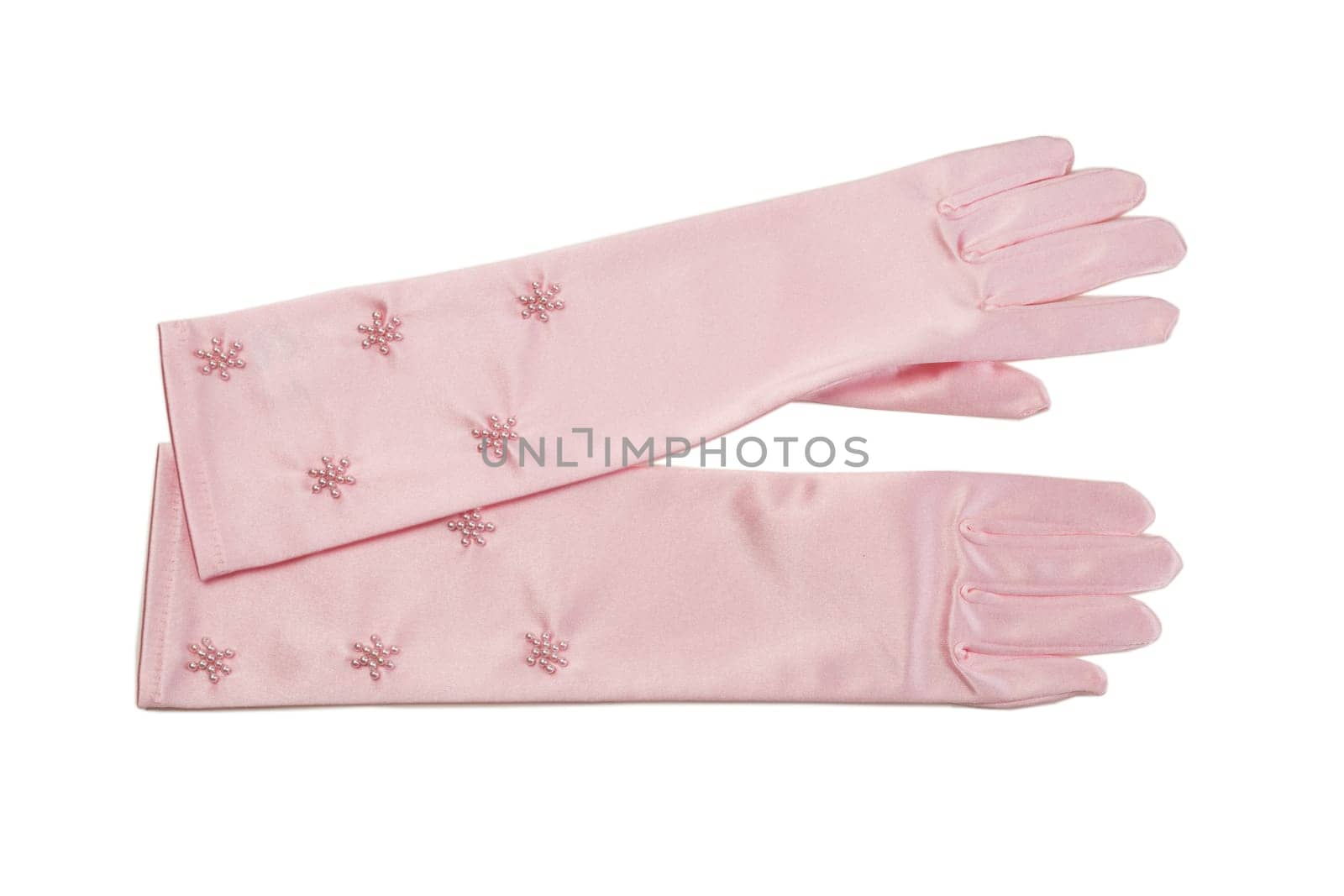 Pair of pink long silk gloves with rhinestones. Isolate on white.