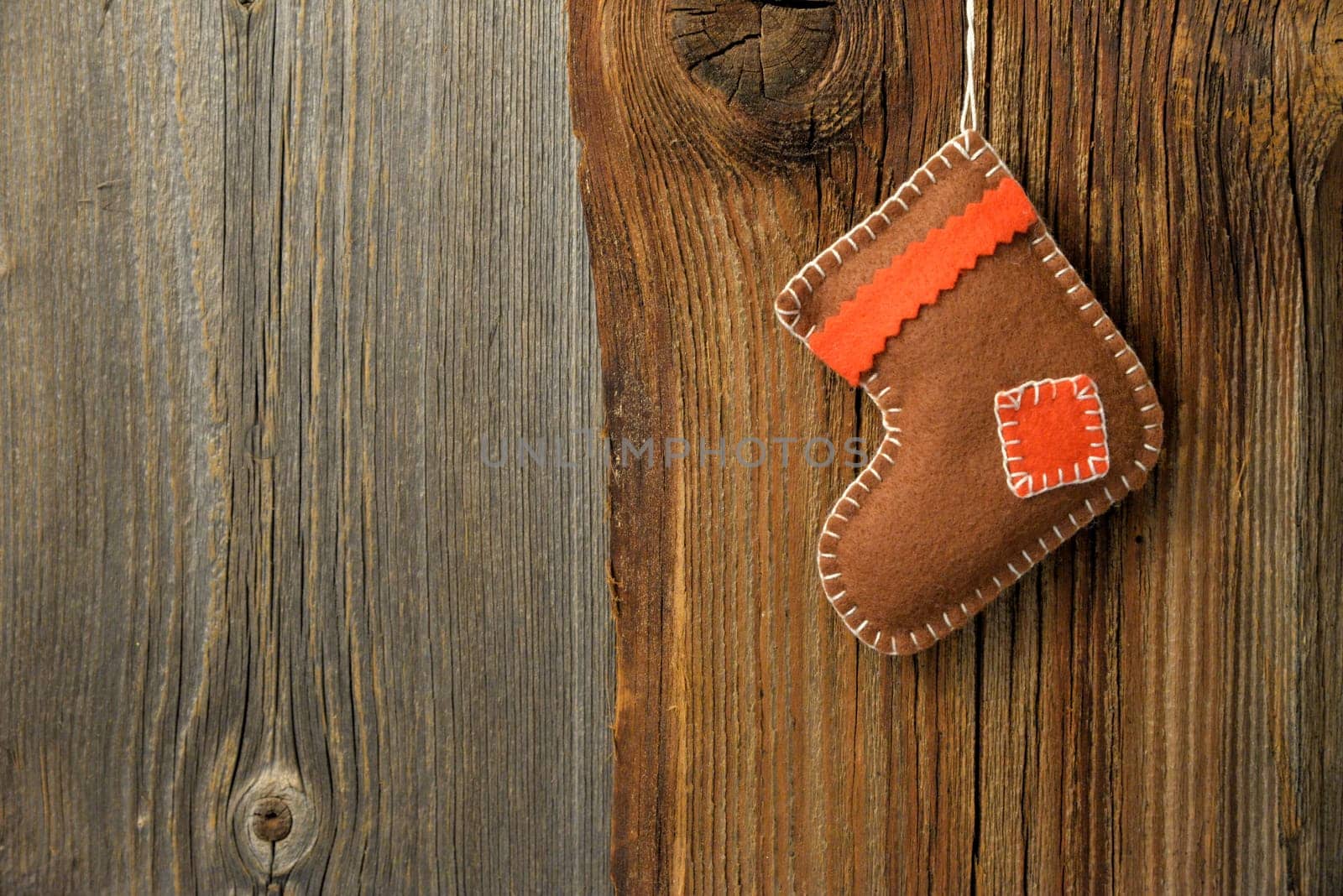 Christmas wooden background with tree and boots banner