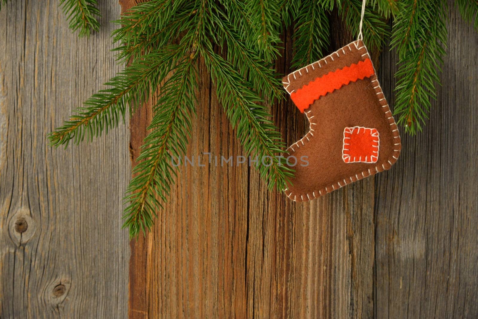 Christmas wooden background with tree and boots banner