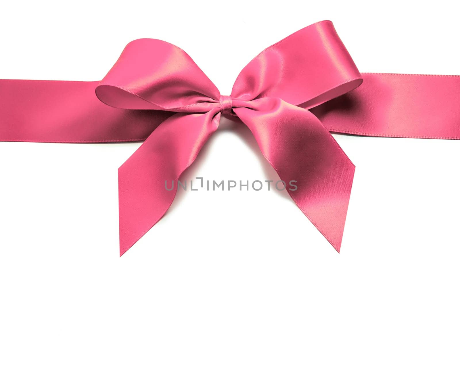 Pink ribbon and bow isolated