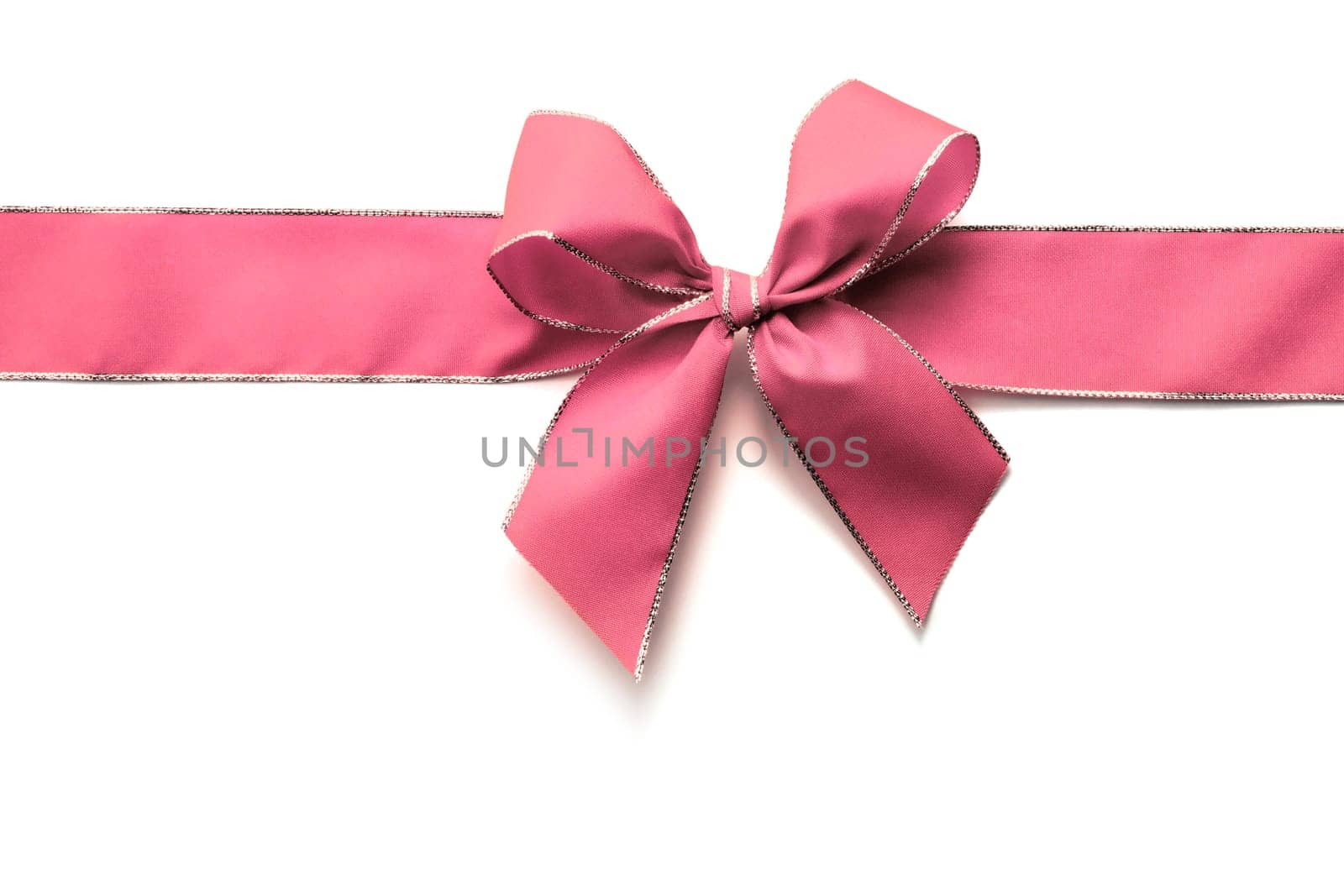 Pink ribbon and bow isolated