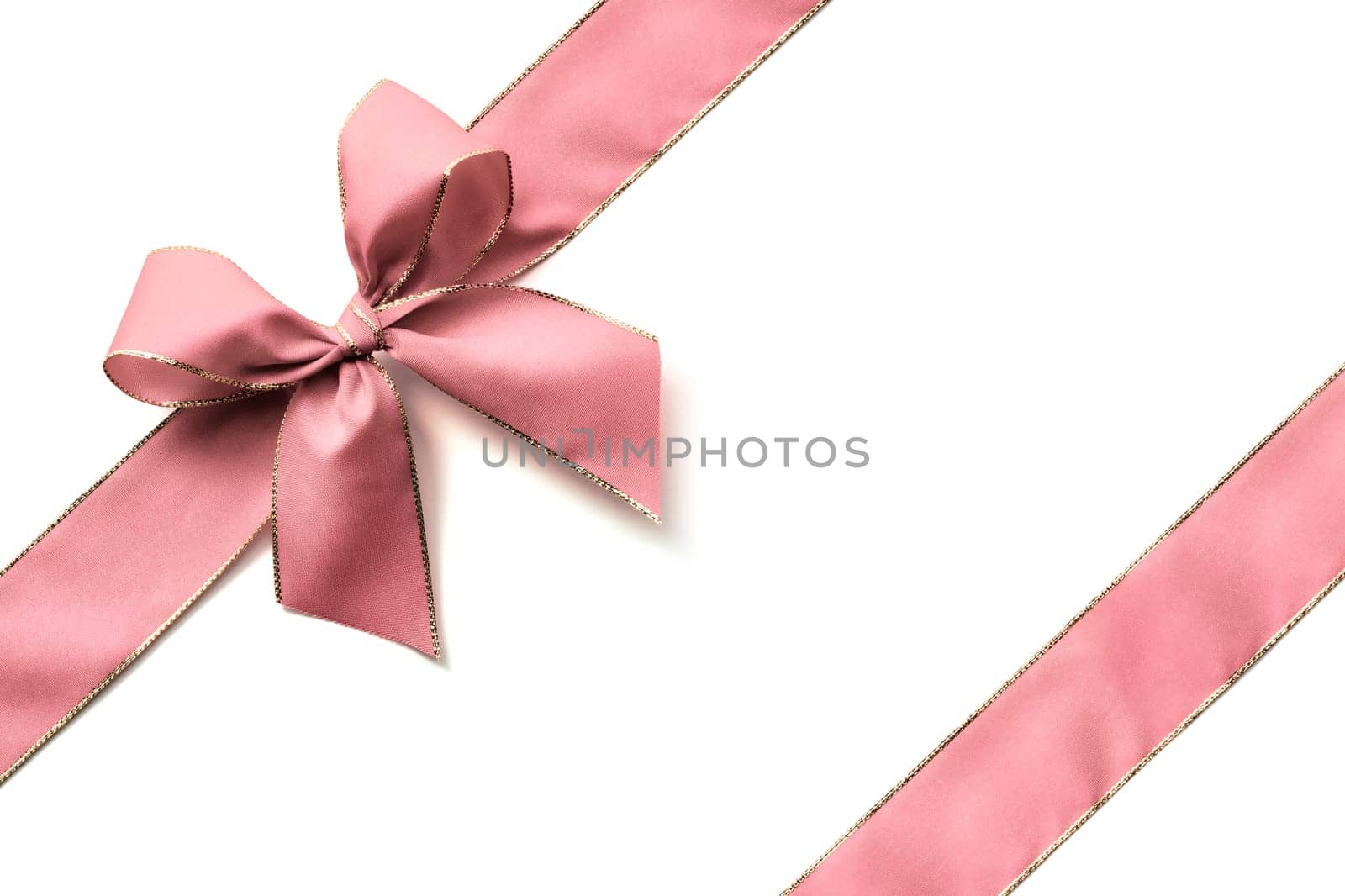 Pink ribbon and bow isolated