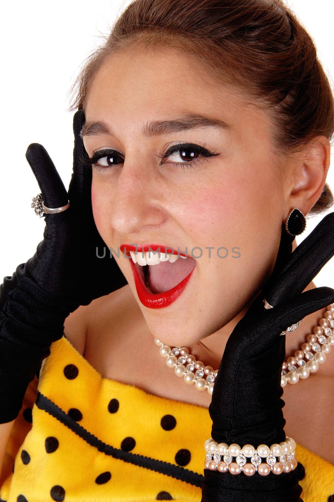A gorgeous woman screaming with open mouth and red lipstick, closeup.with black cloves, isolated for white background..