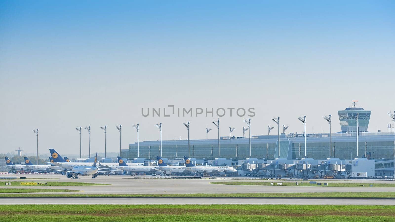 Munich, Germany - May 6, 2016: The new modern Lufthansa satellite terminal at Munich airport, in operation since April 2016, is Germany’s first midfield international passenger terminal.